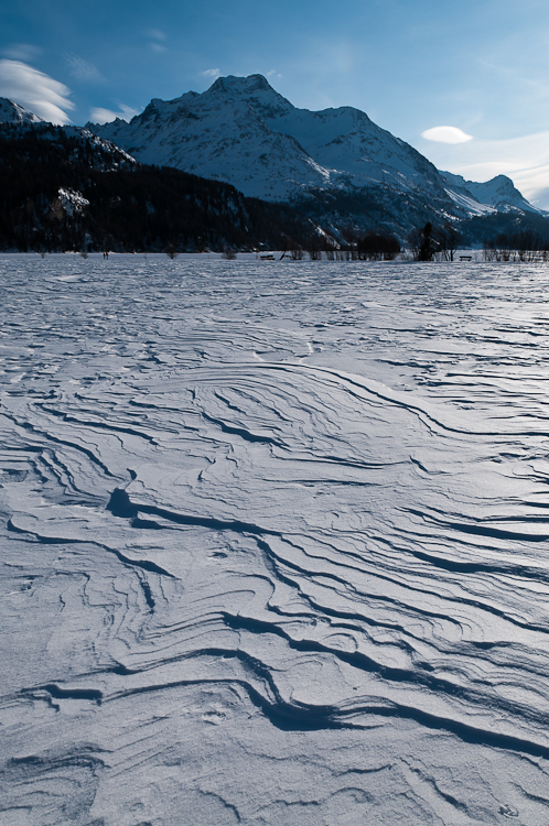 Piz Margna and Snowdrift formations, Wind sculpted snow fields. Abstract Formation, Engadin, Graubünden, Sils / Segl, Sils/Segl Baselgia, Snow, Switzerland, Waves of Ice, Winter