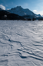 Piz Margna and Snowdrift formations, Wind sculpted snow fields. Abstract Formation, Engadin, Graubünden, Sils / Segl, Sils/Segl Baselgia, Snow, Switzerland, Waves of Ice, Winter