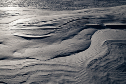 , Windblown snow drifts created icy waves. Abstract Formation, Engadin, Graubünden, Snow, Switzerland, Waves of Ice, Winter