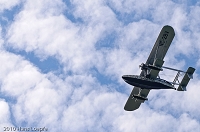 Sikorsky S-38 flying over the expected landing site on the lake of Zurich.