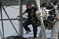 Sikorsky S-38 preparing for departure towards the wind. Tom Schrade, the pilot is standing on the bow of this masterpiece of aircraft.