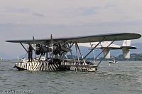 Sikorsky S-38 preparing for departure towards the wind. Tom Schrade, the pilot is standing on the bow of this masterpiece of aircraft.