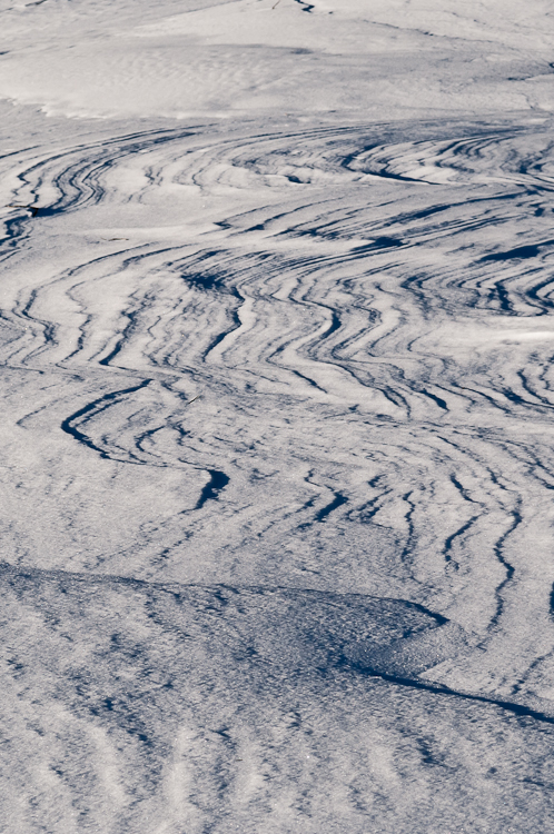 Snowdrift formations, Windblown snow drifts created icy waves. Abstract Formation, Engadin, Graubünden, Snow, Switzerland, Waves of Ice, Winter