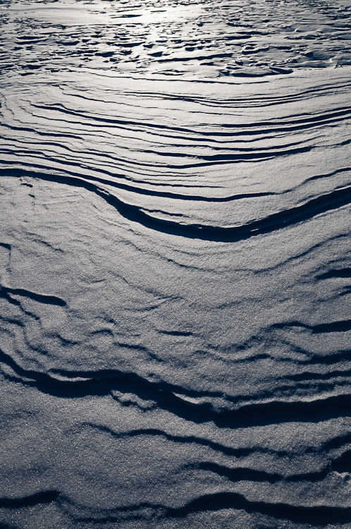 Snowdrift formations, Windblown snow drifts created icy waves. Abstract Formation, Engadin, Graubünden, Snow, Switzerland, Waves of Ice, Winter