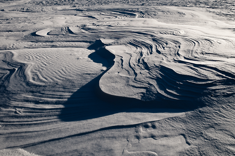 Snowdrift formations, Windblown snow drifts created icy waves. Abstract Formation, Engadin, Graubünden, Snow, Switzerland, Waves of Ice, Winter