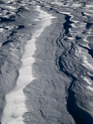 Snowdrift Formations, Wind sculpted snow fields. Abstract Formation, Engadin, Golfcourse, Graubünden, Sils / Segl, Sils/Segl Baselgia, Snow, Switzerland, Waves of Ice, Winter