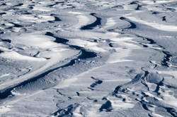 Snowdrift Formations, Wind sculpted snow fields. Abstract Formation, Engadin, Graubünden, Sils / Segl, Sils/Segl Baselgia, Snow, Switzerland, Waves of Ice, Winter