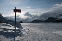 Pointer to the Wind sculpted snow fields, View towards Maloja from the lake shore of Lej da Segl ready for the Engadin Marathon Engadin, Graubünden, Sils / Segl, Sils/Segl Baselgia, Snow, Switzerland, Waves of Ice, Winter