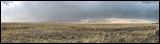 Great Sand Dunes National Park, The Great Sand Dunes near Alamosa, Colorado represent a rather unique gesture of Nature.<br>Sand is carried in by winds that are funneled through a gab in the Sangre de Cristo mountain range. This gap creates mini low pressure system causing percipitation. The sand carried in by the winds and rain drop onto the Dunes while the rain and the melt water in spring carry the water back out into the plains concluding the cycle. Amazingly the current shape of the Sand Dunes did not change very much over a century. This was revealed through photographs that can be seen at the visitors center., 2006 / 04_05 NP Sand Dunes, Alamosa, United States of America, Clouds, Weather, Sangre de Cristo, Mountians, Horizon, Sky, Sanddunes