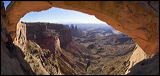 Moring light at Mesa Arch, Canyon Lands, The Mesa Arch is not only famous among photographers for amazing sunlight conditions, also the view features stunning impressions on the 'making of' the Canyon Lands. The washboard women (middle of the image) keeps a close eye on further developments.<br>, 2006 / 04_11 NP Canyonlands Mesa Arch, Moab, United States of America, Panorama, Mesa Arch, Canyon Lands, Colorado Plateau, The Grand Staircase