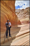The Wave at Coyote Buttes, Paria Canyon and Vermilion Cliffs Wilderness area, The Photographer in the Wave, Paria Canyon Vermilion Cliffs Wilderness Area, Utah, Arizona, 2006 / 04_23 The Wave, Page, United States of America, Photographer, The Wave, Coyote Buttes, Paria Canyon, Wilderness area, Colorado Plateau, The Grand Staircase, Vermilion Cliffs, petrified Sand Dunes, Coyote Buttes South, Paria Canyon, Vermilion Cliffs, Wilderness Area, Page, Kanab, petrified Sand Dunes, Wind, Erosion