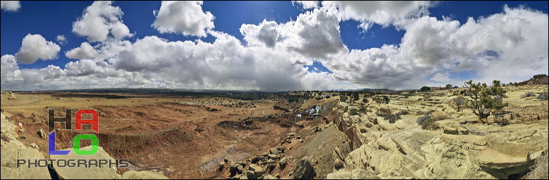 San Raffael Reef, Interstate 70 winds itself from Salina to Greenriver high up to the plateau of the San Raffael Swell offering phantastic sceneries. At Spotted Wolf (only a few Miles before getting into Green River) the road building engineers of I-70 had to overcome the San Rafael Reef., Greenriver, Utah, Panorama, I-70, Clouds, Colorado Plateau, The Grand Staircase, 20287-20310.jpg